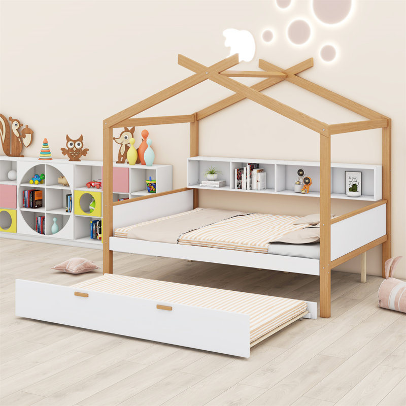Wooden House Bed With Original Wood Colored Frame Trundle And Bookshelf Storage Space For Children Or Guest Room