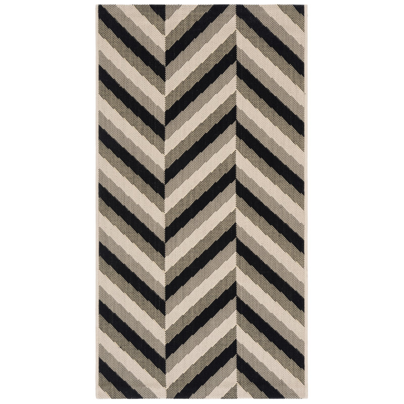 Tapis extérieur crème / noir Arneshia