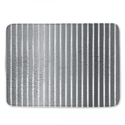 Tapis de bain noir et blanc à rayures