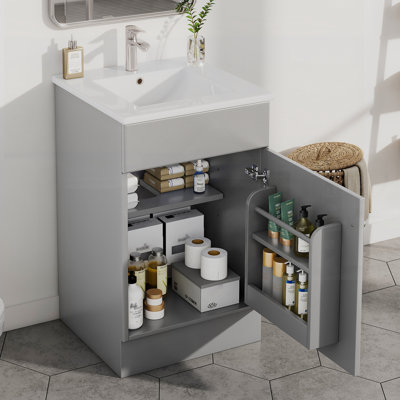 Meuble-lavabo gris élégant avec lavabo, porte d'armoire et tablettes réglables pour un rangement amélioré et une esthétique moderne