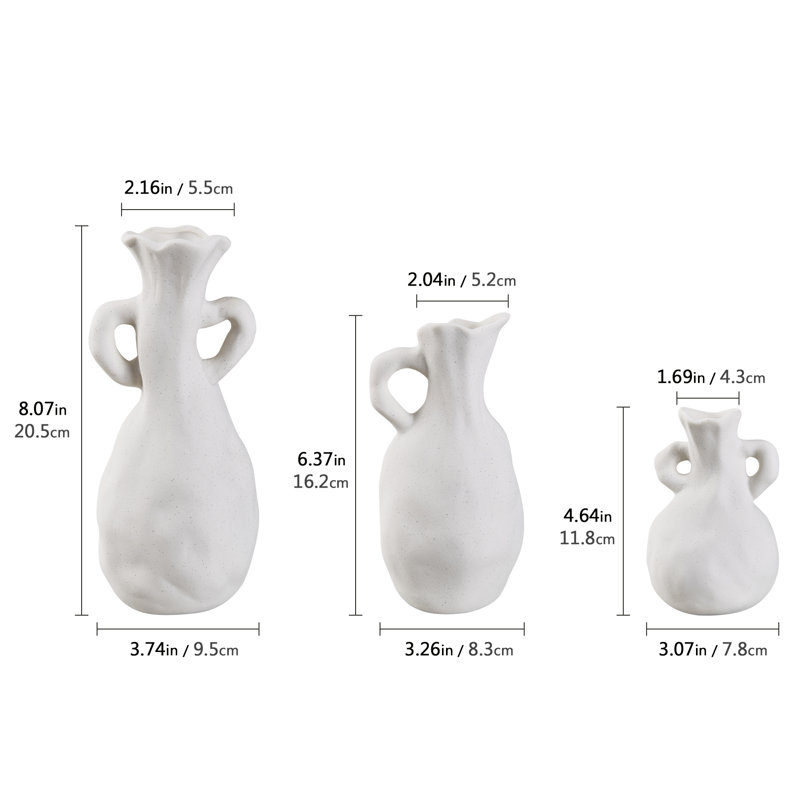 3 petits vases blancs pour la table basse du salon