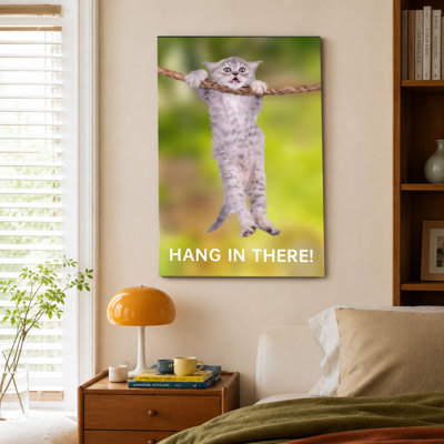 affiche murale chat suspendu