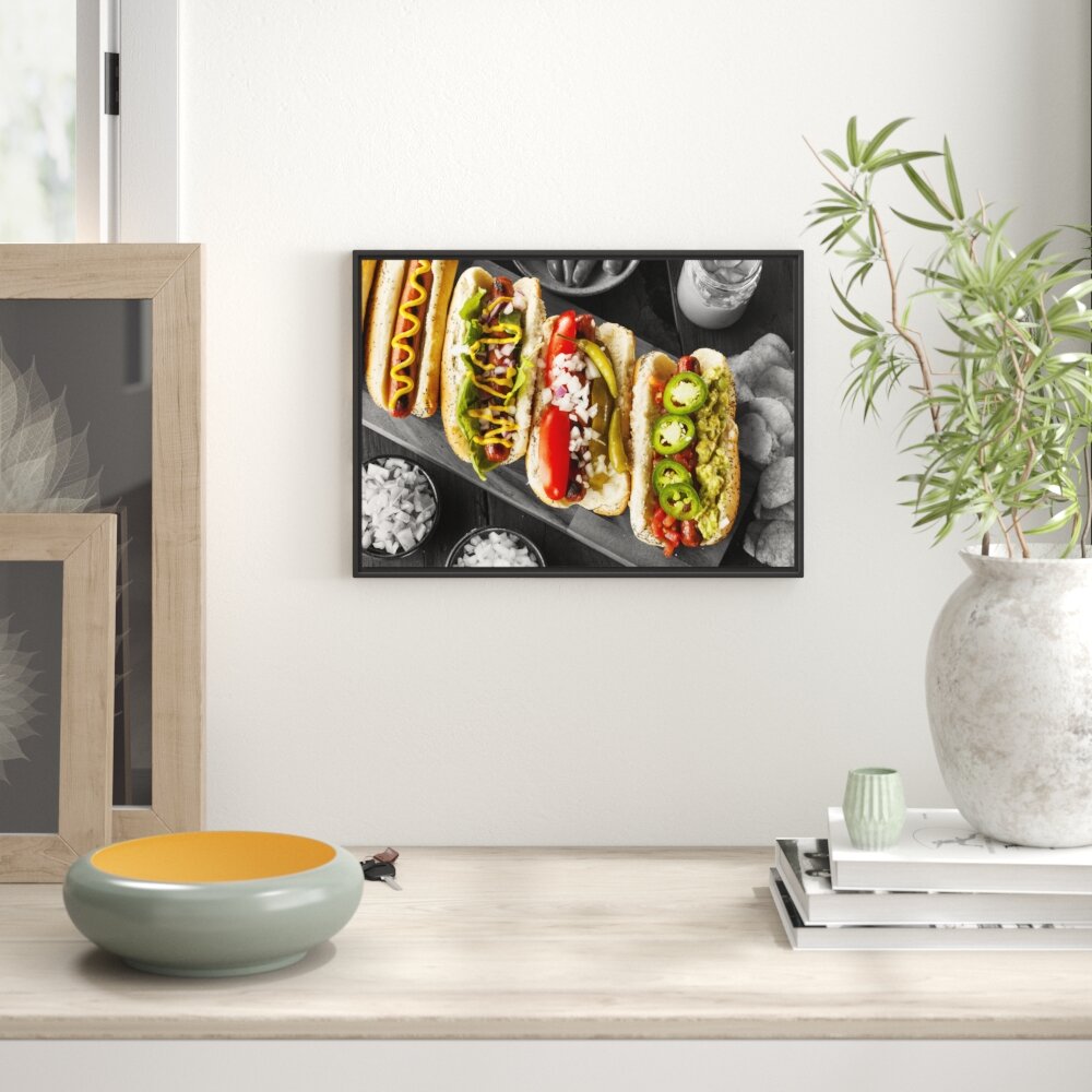 Gerahmtes Wandbild Delikate Hotdogs