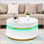 Table basse ronde blanche avec plateau en verre et lumières DEL, parfaite pour les salons modernes et élégants