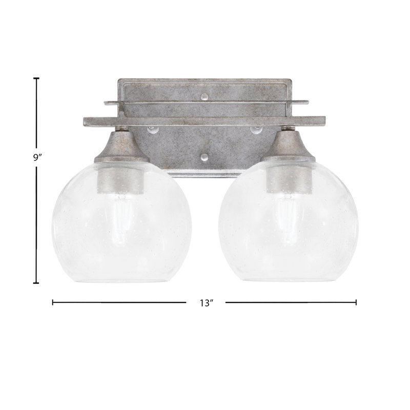 Uptowne 2 Light Bath Bar Shown In Aged Silver Finish With 5.75" Glass, Clear