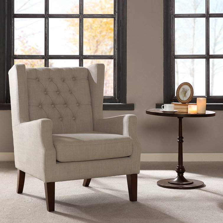 Manns Upholstered Button Tufted Wingback Chair