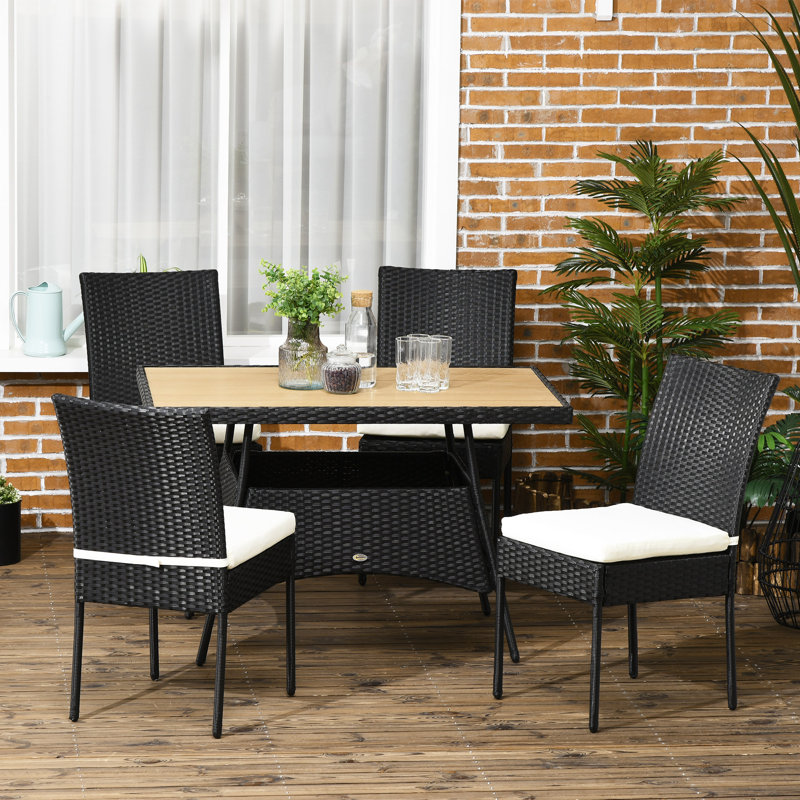 Ensemble de salle à manger en rotin 5 pièces Wildon Home®, table de salle à manger en osier et 4 chaises avec plateau WPC et sièges rembourrés, crème