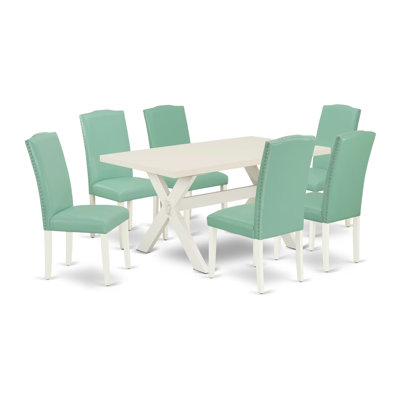 Ensemble de table de cuisine 7 pièces comprenant une table à manger rectangulaire avec pattes en X et 6 chaises de salle à manger Parson en similicuir multicolore.