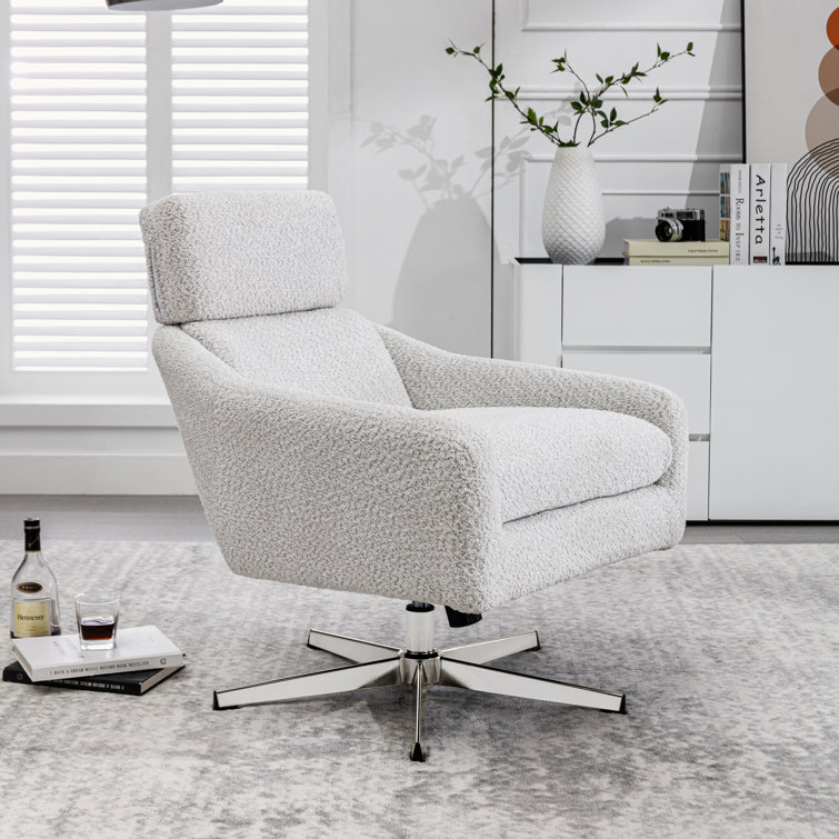 Ivy Bronx Depoliti Oversized Swivel Chair with storage ottoman and