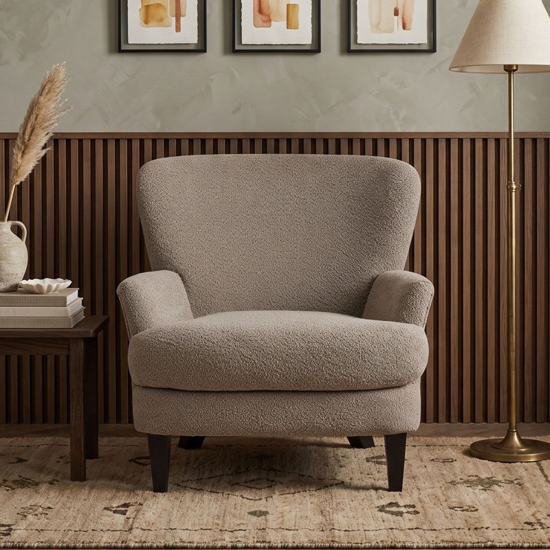 Fauteuil club rembourré avec pieds