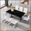 Table de salle à manger moderne et minimaliste avec verre imitation marbre noir, résistante à la chaleur et spacieuse pour des rassemblements élégants.