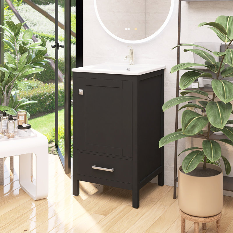 Meuble-lavabo gain de place avec lavabo en céramique, tiroirs à fermeture douce, organisateur de porte, tiroir séparateur et pieds en plastique réglables.