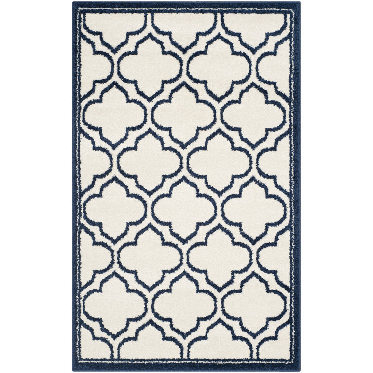 Ammundsen Geometric Area Rug in Ivory/Navy
