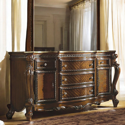 Commode vintage en bois massif à 5 tiroirs, 2 portes et détails sculptés