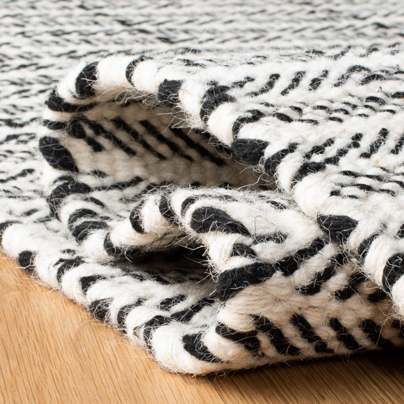 Black and Ivory Hand Tufted Wool Rectangular Rug