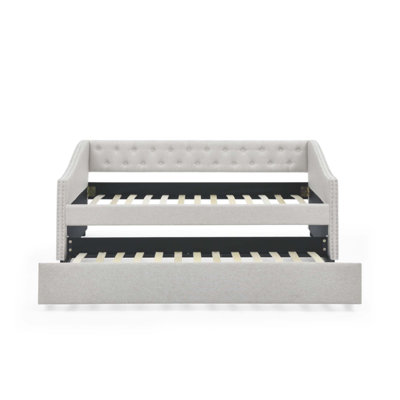 Mid-Century Inspired Daybed with Trundle, Tufted Back, and Waved Arms for Elegant and Functional Living