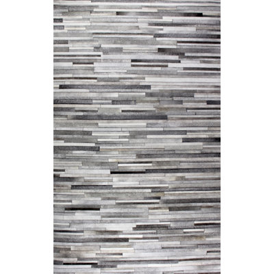 Lindahl Cowhide Geometric Indoor Rug