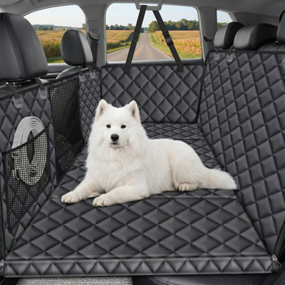 Rear seat extension system for canines featuring rigid-base automobile seat cover accompanied by one leak-proof absorbent pad, pet hammock for cars and sport utility vehicles, protective travel bed for rear passenger area.