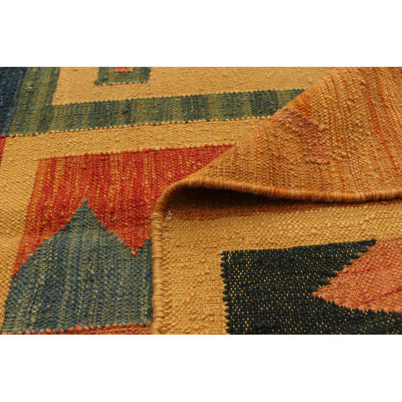 Tapis en laine brun clair fait à la main