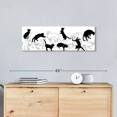 Chats noirs et blancs sur toile