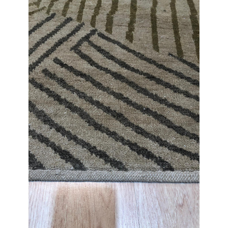 Élégant tapis beige noué à la main