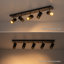 Projecteur sur rail noir et or à 5 lampes avec têtes rotatives