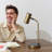 Ezra 16.5" Modern LED Desk Lamp with Gold Finish, Wireless Charging Pad, Adjustable Head, and 3-Way Dimming-69896189