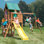 Altamont Wooden Swing Set with Slide, Swings and Climbing Wall