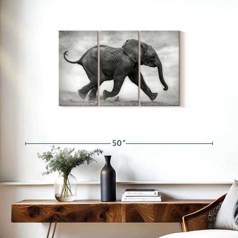 Bébé éléphant qui court, H 20 po x l 33 po