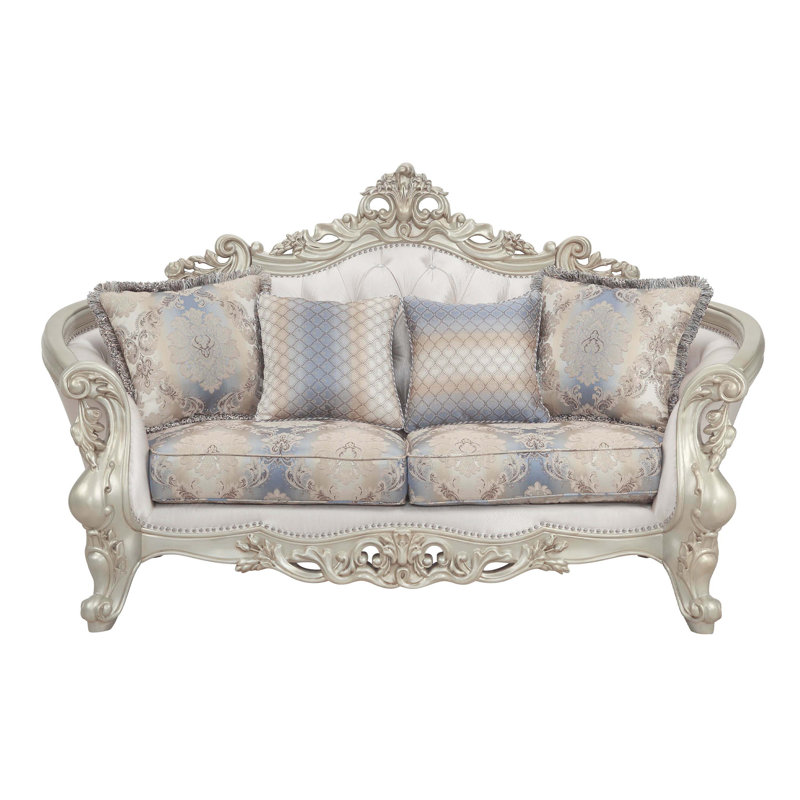 Elegant Floral Tufted Fabric Loveseat with Rolled Arms and Nailhead Accents