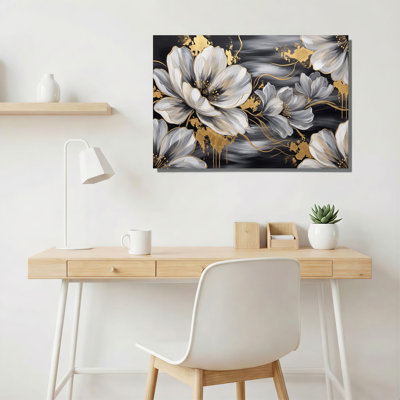Tableau mural sur toile noire représentant des fleurs blanches et grises rehaussées de touches dorées
