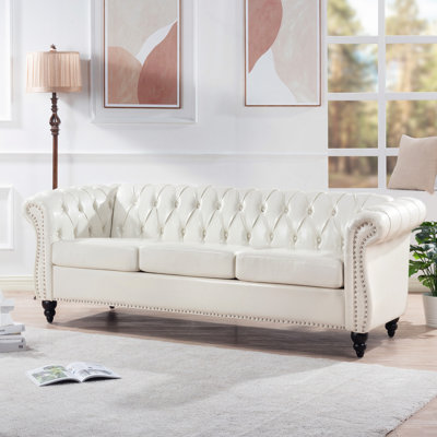 Canapé Chesterfield à accoudoirs roulés 3 places