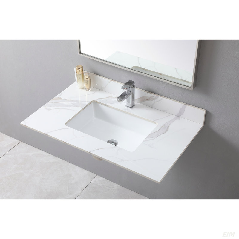 Dessus de meuble-lavabo en pierre de 37 po avec un lavabo rectangulaire encastré en céramique et un trou de robinet