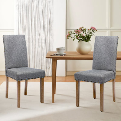Chaises de cuisine rembourrées élégantes en lin Rucha avec pieds robustes en bois d'hévéa et garniture cloutée