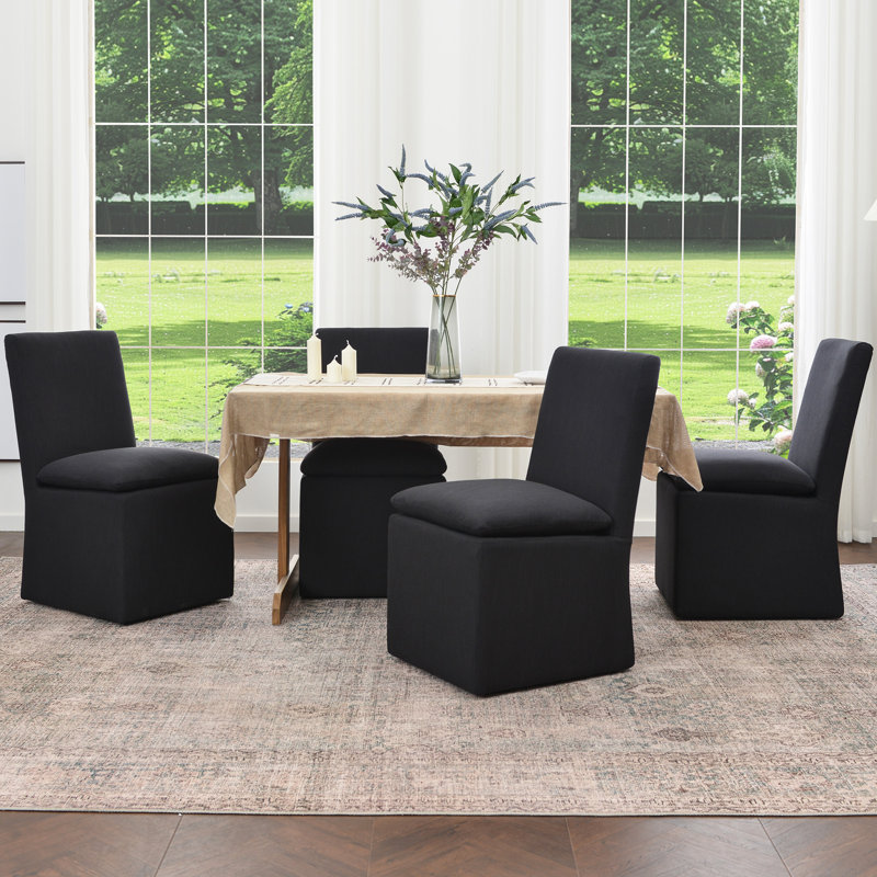 Chaise de salle à manger rembourrée en lin 21 po avec roulettes interchangeables et pieds fixes (ensemble de 4), Noir