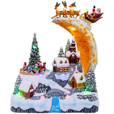 Kurt Adler Battery-Operated LED Santa on Sled with Deer Table Piece, 11.5in