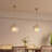 1-Light Ribbed Glass Pendant Light with Matte Brass Accents