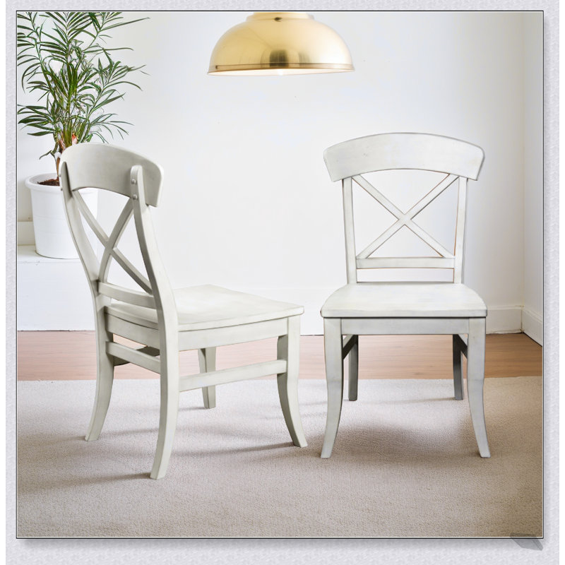 Ensemble de 2 chaises d'appoint à dossier croisé Harola, finition blanc fumé, confortable et élégant pour les repas modernes