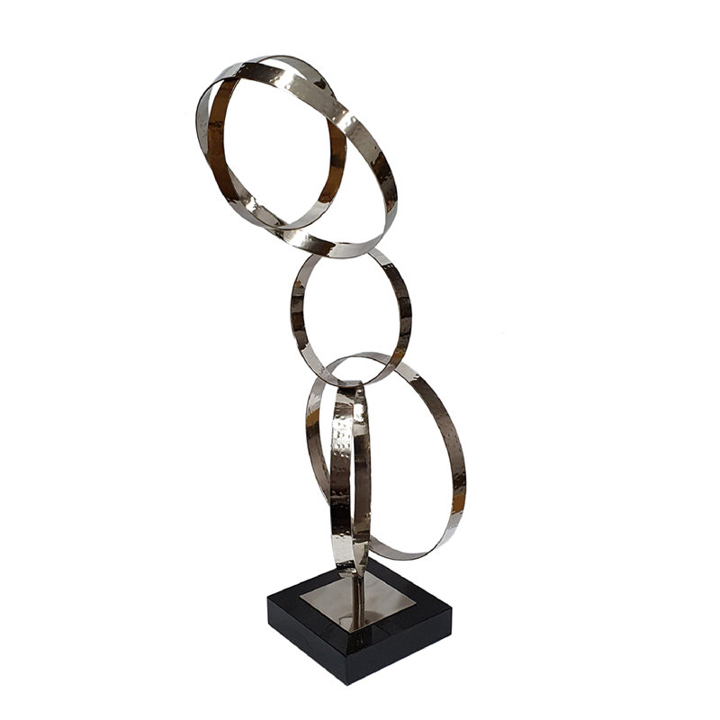 Silver and Black Metal Ring Figurine with Marble Base