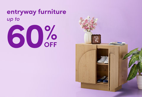 Entryway furniture up to 60 percent off featuring a wooden shoe storage cabinet with a vase of flowers on top.