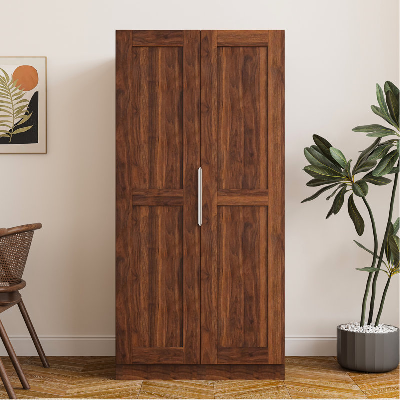 Le buffet autoportant en noyer de 64,63 po avec portes et tablettes offre un espace de rangement supplémentaire en noyer pour une organisation efficace de la chambre à coucher