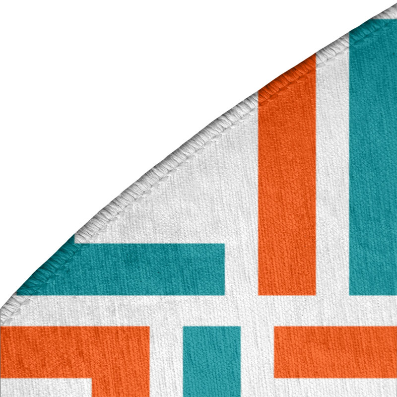 Tapis rond à motif géométrique orange / vert