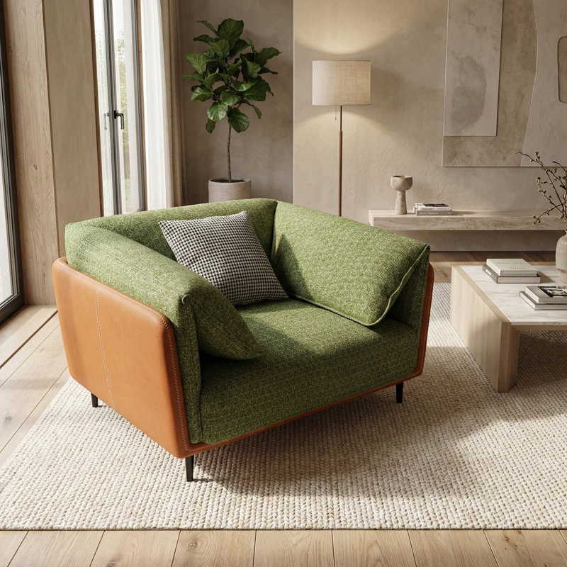 Fauteuil moderne à assise profonde avec revêtement vert olive et accoudoirs bouclés orange