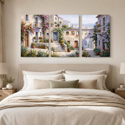 «Sunlit Stone Village Street with Colorful Flower Balconies», ensemble de 3 toiles murales
