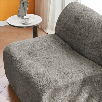 Fauteuil à compression simple en mousse avec repose-pieds et coussin ultra-confortable et peu encombrant - une chaise longue moderne et minimaliste pour le salon ou la chambre à coucher