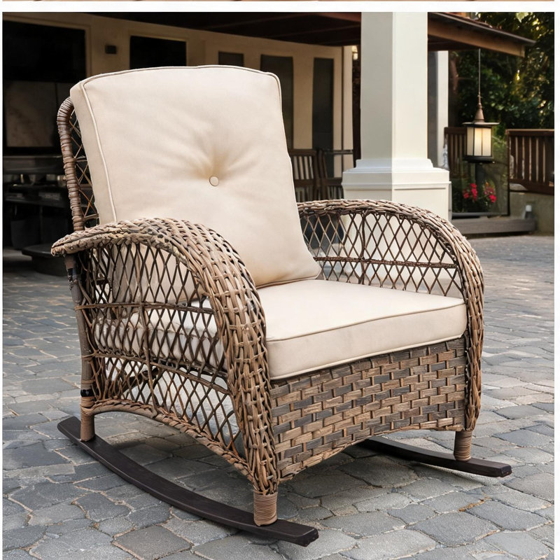 Chaise berçante simple en osier avec coussins en mousse et structure en acier thermolaqué beige neutre