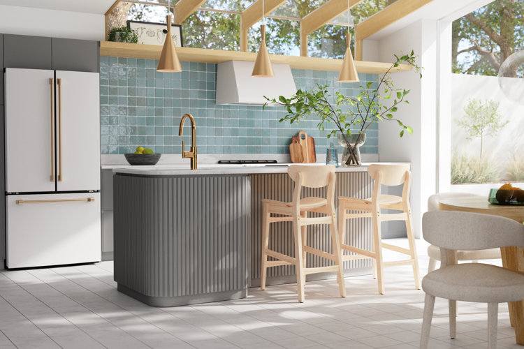 modern organic kitchen with teal backsplash and light gray floor tile