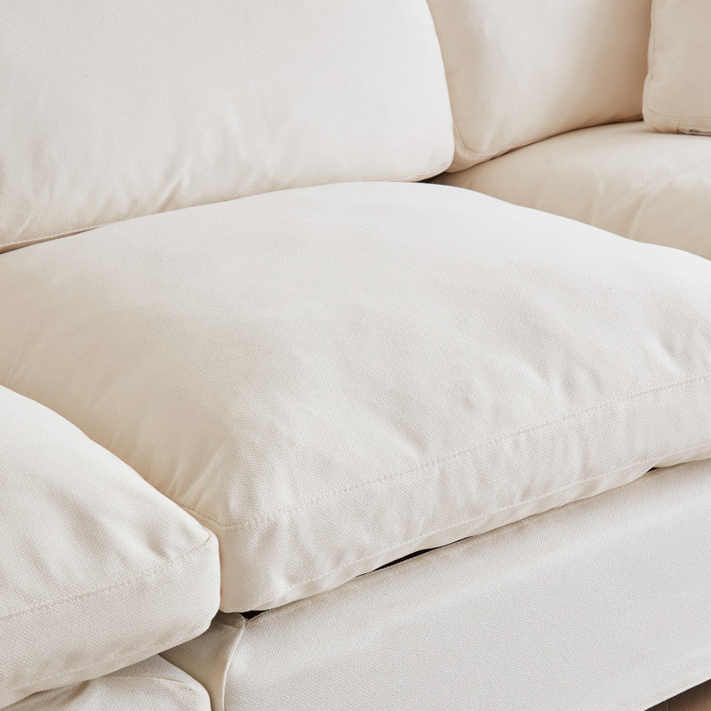 Canapé d'angle modulaire Cloud Couch, confort optimal. Sans compression sous vide. Garnissage en duvet et coton. Housses lavables - 3 places, blanc cassé.