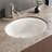 Ruvati 16 x 13 inch Undermount Bathroom Sink Oval Porcelain Ceramic with Overflow-93986364