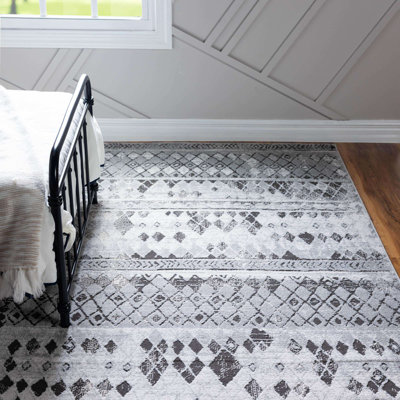Tapis géométrique gris